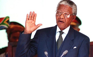 Apartheid dismantled — first multiracial elections in South Africa