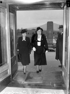 Senator Dorothy M Tangney (left) and Dame Enid Lyons GBE entering the front door of the House of Representatives.